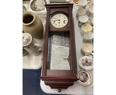 A SEWILLS LIVERPOOL MODERN WESTMINSTER CHIME WALL CLOCK WITH KEY - 85 X 24 CM 