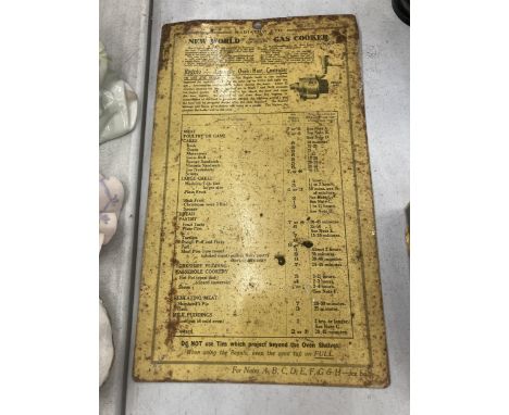 A DOUBLE SIDED ENAMEL SIGN BY 'NEW WORLD GAS COOKER' 18CM X 30CM 