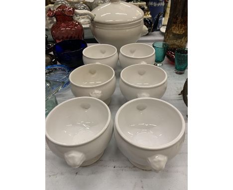A WHITE CERAMIC SOUP SET TO INCLUDE A SOUP TUREEN WITH LADEL AND SIX SOUP BOWLS 