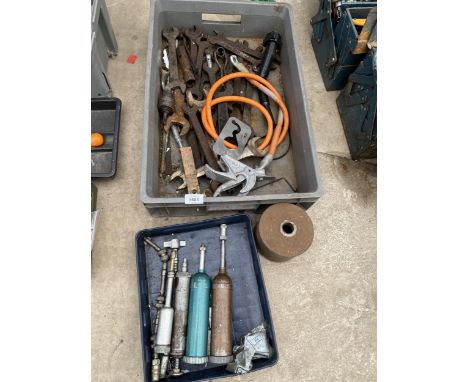 AN ASSORTMENT OF TOOLS TO INCLUDE SPANNERS AND GREASE GUNS ETC 