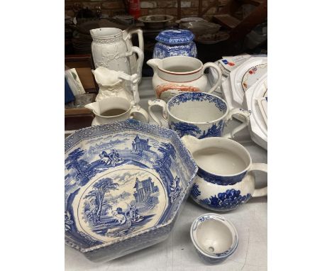 A QUQNTITY OF CERAMIC ITEMS TO INCLUDE PARIAN WARE STYLE JUGS, BLUE AND WHITE BOWLS, JUGS, A RINGTONS TEA CADDY, ETC 