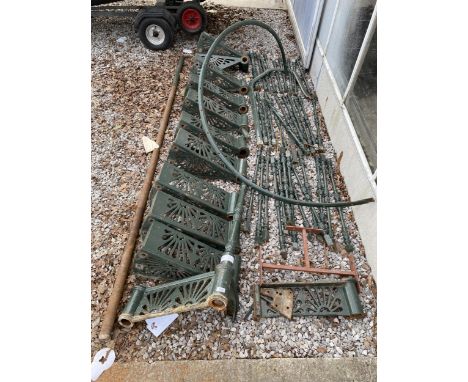 A BELIEVED COMPLETE VINTAGE CAST IRON SPIRAL STAIRCASE WITH HANDRAIL AND RODS 