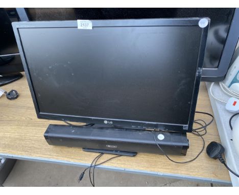 AN LG COMPUTER MONITOR AND A SPEAKER 