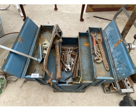 A METAL TOOL BOX CONTAINING AN ASSORTMENT OF SPANNERS AND GRIPS ETC 