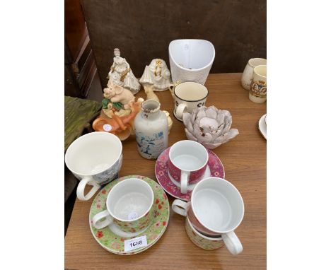 AN ASSORTMENT OF CERAMIC ITEMS TO INCLUDE CUPS AND FIGURES ETC 