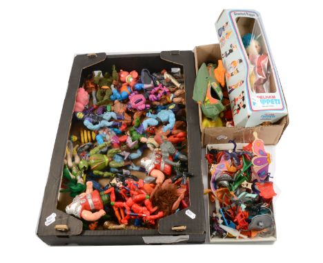 A collection of 1980s action figures, 40+ including early Star Wars figures; He-Man action figures; Care-bears; with a bag of