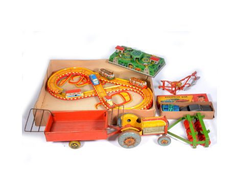 Tin-plate toys; including Japanese made New European Car, battery operated, boxed; Mettor tractor, with trailer, plough and f