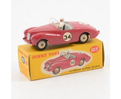 Dinky Toys die-cast model no.107 Sunbeam Alpine Sports, deep pink body, cream hubs, no.34 racing number, boxed.