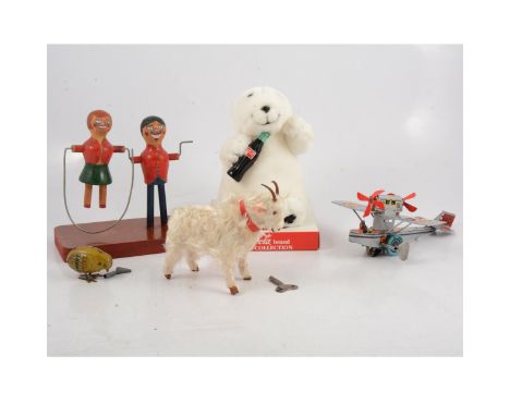 Vintage toys; five including German tin-plate clock-work chick, with Minic key stamped DRGM; a German clock-work goat, 15cm; 