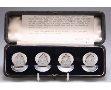 A CASED SET OF FOUR GEORGE V SILVER MENU HOLDERS, by Sampson Mordan &amp; Co, London 1915, with circular bases and backs, eac