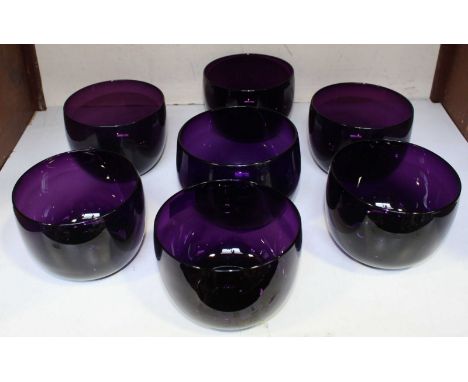 SECTION 9. A Set of Seven late 19th/early 20th Century Amethyst glass finger bowls, approximately 10cm high (7)