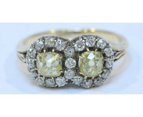 A Victorian 18ct gold and two-stone yellow diamond ring, claw-set to the top with two Victorian-cushion-cut yellow diamonds, 