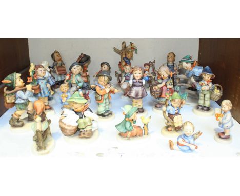SECTION 1. A collection of 25 Goebel Hummel figurines including; Strolling along, Retreat to safety, Playmates and Apple Tree