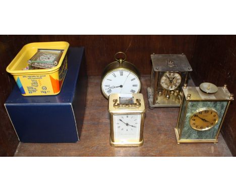 Five various clocks including a silver plated carriage clock by Mappin and Webb (AF) and a brass carriage clock among others.