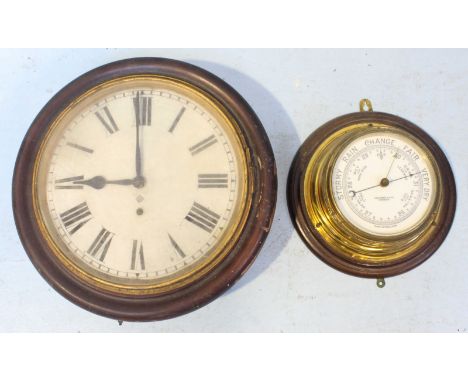 A brass mounted bulkhead barometer by John Barker and co. ltd Kensington, together with a stained wood circular wall clock wi