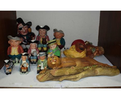 SECTION 5.  Two Bossons painted ceramic wall figures, ''Lynx,' and 'Arabian horseman' together with nine various 'squire' jug