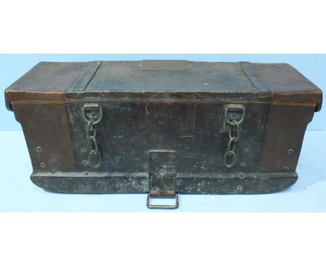 A 19th Century leather coaching trunk, with strapwork and brass studded decoration, handles and brass escutcheons. 88cm wide.