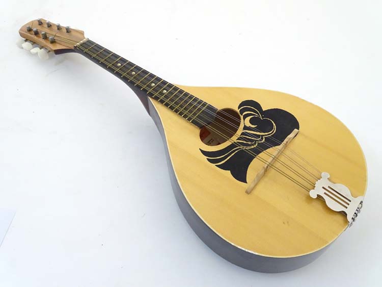 Musical Instruments A mid 20thC Greek Mandolin , of cedar and beech