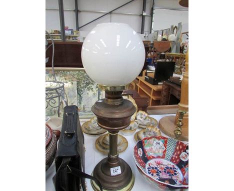 A brass oil lamp