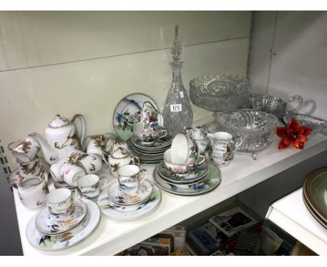 A mixed lot of oriental porcelain tea ware and glass ware (one shelf)