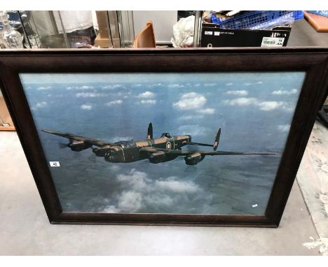 An oak framed aircraft print