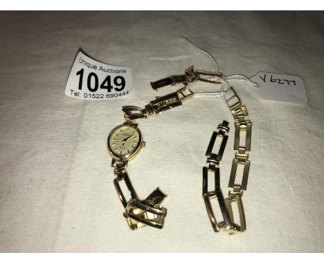 A 9ct gold Rotary wrist watch with 9ct gold strap together with a 9ct gold watch strap a/f, gross weight 19 grams