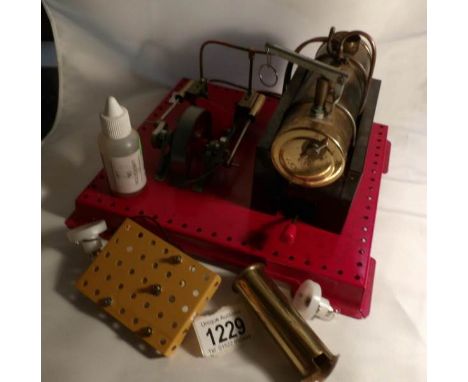 A Mamod S.E.3 twin cylinder stationery engine with box, dynamo and accessories