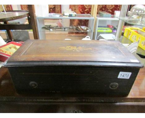 A Victorian music box playing 8 tunes, in good condition with all teeth and pins intact, works well