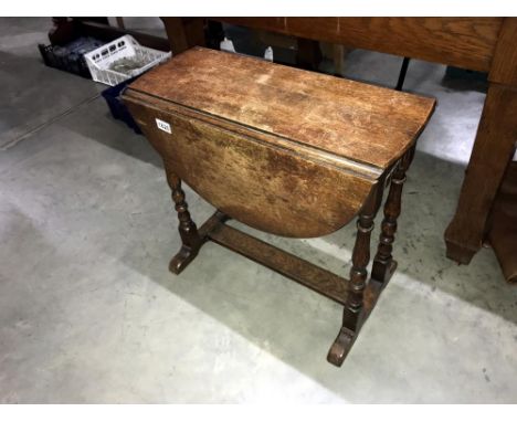 An oak gate leg table