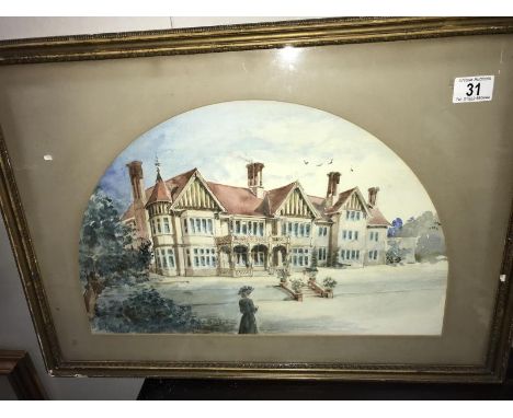 A framed and glazed print of a country house