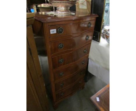 A good 20th century serpentine fronted 6 drawer chest on carved bracket feet, in good condition, height 105cm, width 53 cm