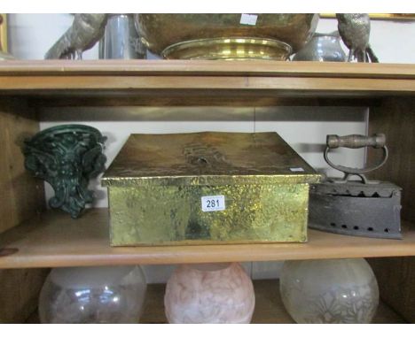 A brass slipper box, a block iron and a cast iron wall bracket