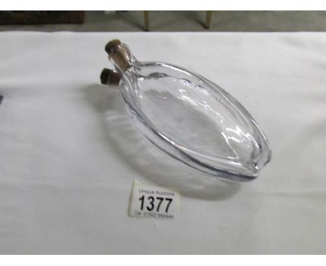 A hand blown Regency twin headed glass flask, circa 1810Chip on bottom rim
