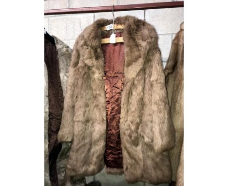 A coney skin fur coat 3/4 length, lining 100% acetate