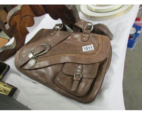 A Christian Dior saddle bag marked on tag 06-MA-0036