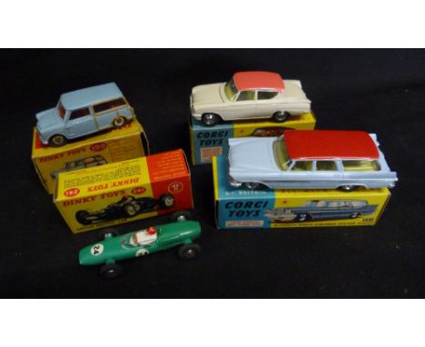 A Dinky Toys Number 199 Austin Seven, together with a Dinky Toys Number 241 Lotus racing car and a Corgi Toys 445 Plymouth Sp