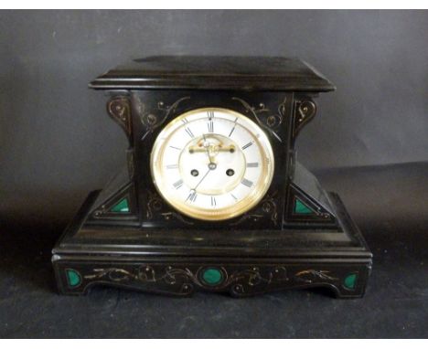 A Victorian Black Slate Mantel Clock, the enamel dial with visible escapement and two train movement