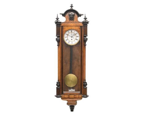 Walnut cased Vienna wall clock with white Roman chapter ring dial with seconds subsidiary below the twelfth hour, 110cm high 