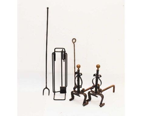 Pair of wrought iron and gilt andirons, Modernist companion set, log fork, etc., 125cm long and smaller