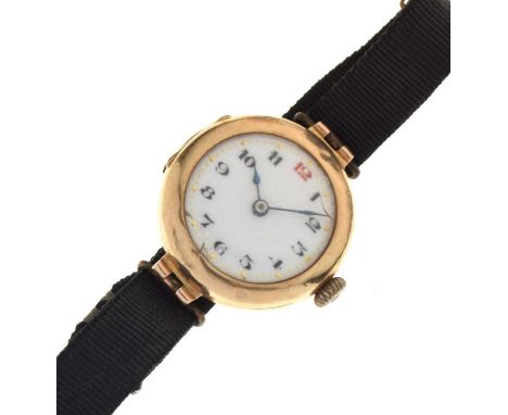 Lady's 9ct gold cased wristwatch having a white enamel Arabic dial with blue steel spade hands, Swiss movement, 25mm diameter
