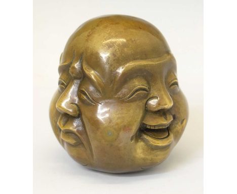 Japanese bronze bust/ paperweight depicting the four faces of Buddha, with four character mark seal to base, 11cm high 