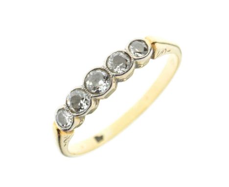 Five stone diamond ring, the old cut diamonds rubover set in white metal to an unmarked yellow metal shank, size P½ approx, 2