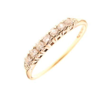 Seven stone diamond half eternity ring, stamped '14K-18K', size Q approx, 1.9g gross approx