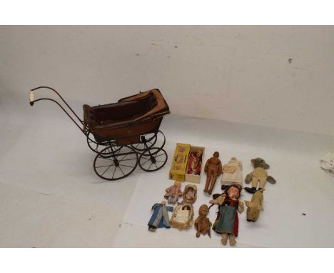 Late 19th or early 20th Century dolls pram with buttoned leather interior, together with a small collection of vintage soft t
