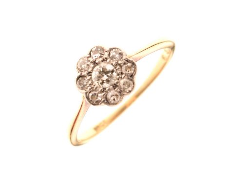 Diamond daisy cluster ring, stamped '18ct', size O approx, 2.3g gross approx