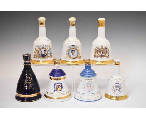 Quantity of Bells Scotch whisky Wade bell decanters including James Watt, Alexander Graham Bell, Christmas, etc (contents unc