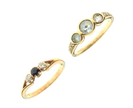 Two 9ct gold dress rings comprising 9ct gold sapphire and diamond three stone ring, size L½ approx, plus 9ct gold three stone