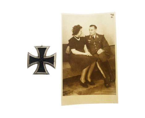 First World War Iron Cross, 2nd class, together with a group of photographs, letter, and envelope, with Third Reich postage s