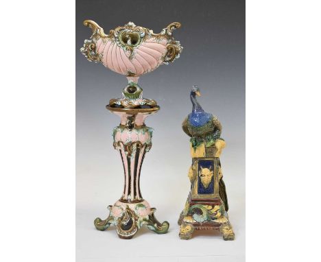 Majolica peacock vase stamped '384' to base, 33cm high, together with a pink group  miniature planter and pedestal, 47cm high