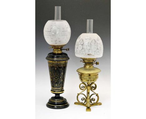 Late Victorian Aesthetic brass oil lamp, with floriate engraved shade over reservoir worked with sunflowers and foliage on sc